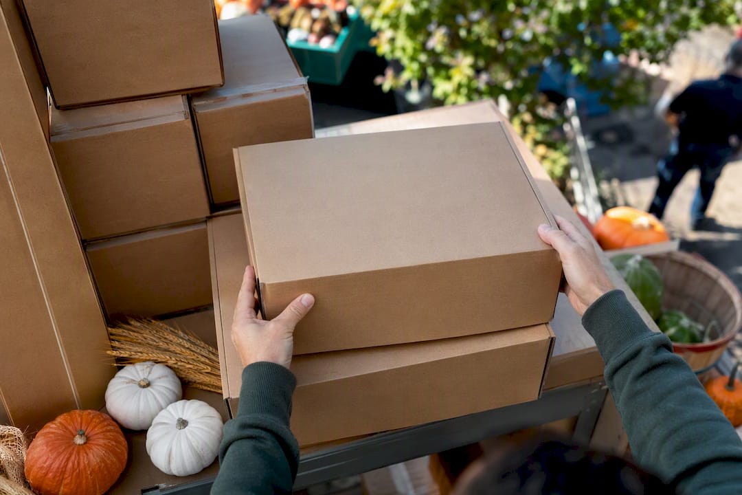 Hands arranging seasonal inventory in retail